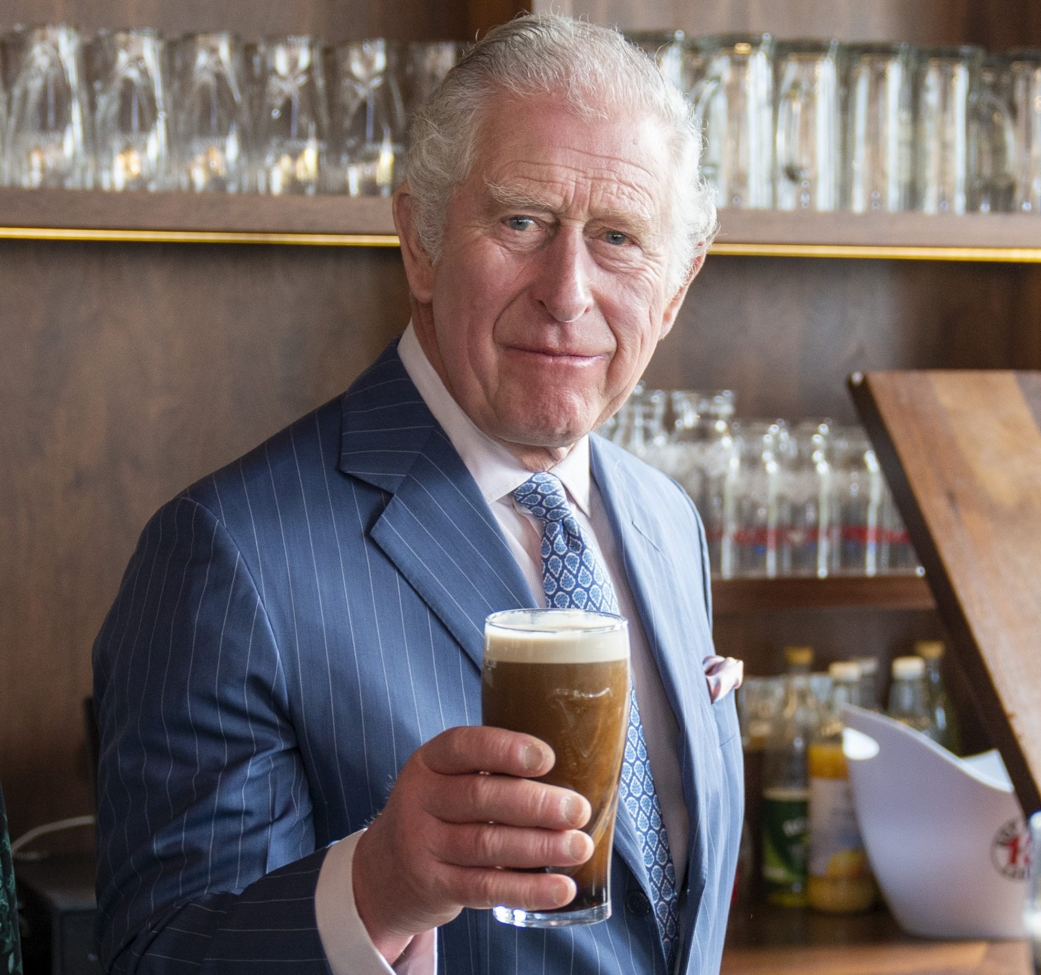 Charles pulls a pint of Guinness ahead of St Patrick’s Day
